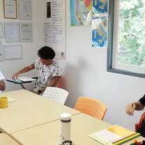 students and assistant teacher Mind