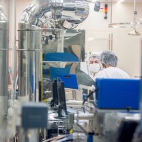 Two lab techs working in the clean room at Khalifa University Two lab techs working in the clean room at Khalifa University