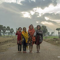 Village families are up working before sun breaks. Farming is the main income source in rural areas. Instead of going to school, children are often asked to stay home for chores or help in the fields.