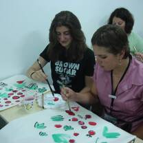 Students learning how to draw a traditional Chinese painting