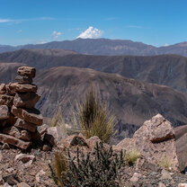Stacked stones for the Pachamama in the Cordillera de Humahuaca in Argentina's Northern mountain desert region