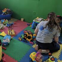 Playing with the children of Teach Me Early Childhood Development Center