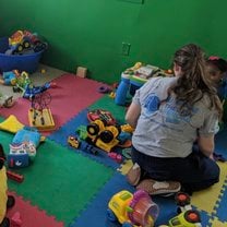 Playing with the children of Teach Me Early Childhood Development Center