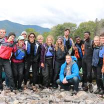 group of people ready to learn to canoe