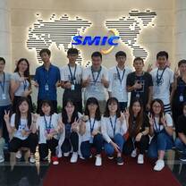 interns from internship in china program happily taking photos with co-workers in SMIC