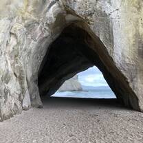 Te Whanganui-A-Hei (Cathedral Cove) Marine Reserve is on the Coromandel Peninsula in New Zealand. Approximately  an hour walk from the car park. Make sure to look up peak hours because it can get quite busy.