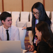I was able to assist students in various aspects of the summit. Here I was helping a student from Colombia with another ambassador from Peru. 