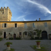 Italian villa in front of bright blue sky