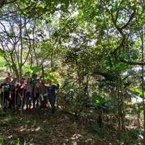 Volunteers with tools in the Sustainable Agroforest (Iracambi, Atlantic Rainforest) Pictured is the group of volunteers I traveled with from the United States during our very first day in the agroforest!  We are all holding the tools we used to crown several trees and cut down branches so the low lying trees/plants can receive the sunlight they need to grow!