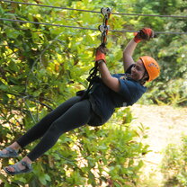 Zip-ling Zip-lining through the canopy of Belize's rainforest