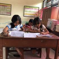 Kids doing some worksheets 