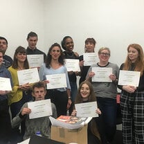 TEFL Graduates Showing their Certificates from London