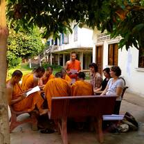 Students meeting with Buddhist monks