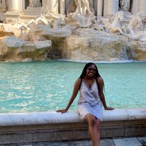 A girl and her Fountain  Sitting on The Trevi Fountain