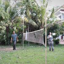 Student playing badminton