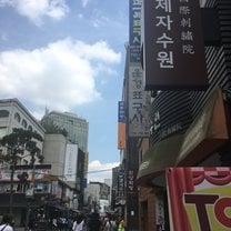 A snapshot of one of the streets in the Seoul area. Plenty of restaurants, plenty of signs, and the hustle and bustle of the public.