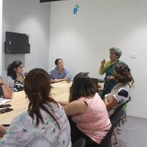 women participating in a discussion panel with Tribes for Good