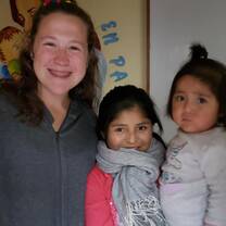 Volunteers and moms work side by side
