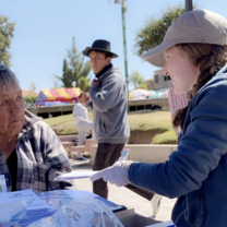 A volunteer helping out on a health campaign. 