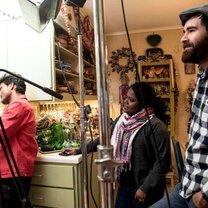 Young people working with filming equipment Young people working with filming equipment