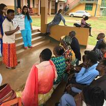 Volunteers leading a health education session at the clinic. 