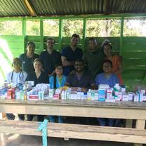 Volunteers helping to organize the pharmacy. 