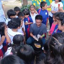 Volunteers helping at a school-based youth club.