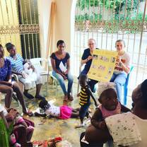 Volunteers leading a health education session in a local mother center. 