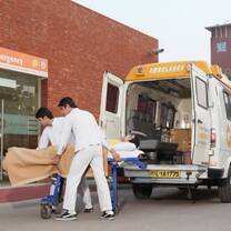 Emergency team with an ambulance