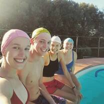 a sparkly clean pool (good work Austin!) and bathing caps to keep it that way