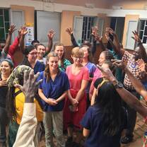 Our wonderful staff thanking our volunteers on their last day at the clinic.