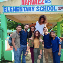 Volunteers having fun outside of a local school! 