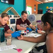 Volunteers helping to take glucose levels. 