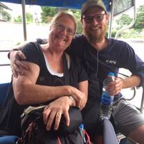Riding the open air bus to village of Surin, Thailand
