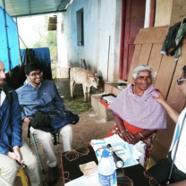 Volunteers helping out at house to house visits. 