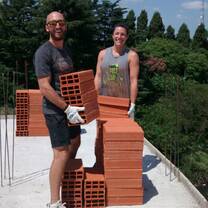 Volunteers Nathan & Lindsey working on the building project