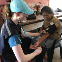 A volunteer taking blood pressure. 