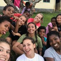 Typical school smiles- This photo was taken one day after school - The Fijian children loved to play with our hair and play games with us all afternoon- As you can tell from this photo- there was never a sad face- on the school grounds - there was endless amounts of fun