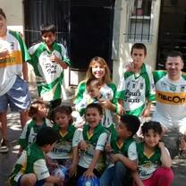 Volunteer Tom gave jerseys of his football team to  more than a dozen children from the orphanage. All smiling to the camera