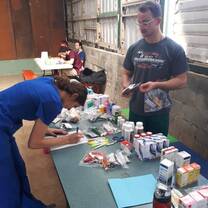 Volunteers assisting in the pharmacy.