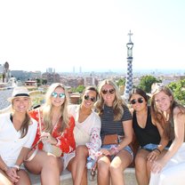 Group of girls in front of Gaudi's Parque Guell in Barcelona