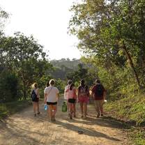 Volunteers hiking on a mobile clinic. 