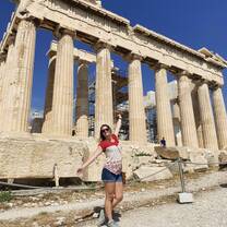 Me in front of the Acropolis after a behind-the-scenes tour with my class!