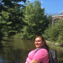 A photo of myself sitting on a bridge next to a canal near the Hortus Garden