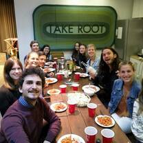 Me, the other residents at The Cape Town Loft and our intern friends sharing a big dinner!