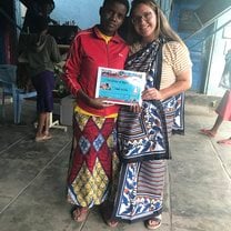 My last day at the shelter being given a conga (what I am wearing) and a certificate of appreciation