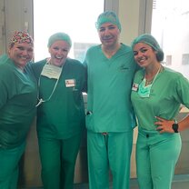 Just saw our first neurosurgery! Picture with two neurosurgeons in the hospital