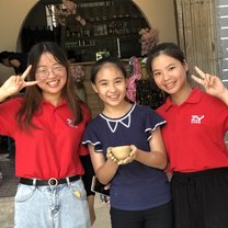 My teaching assistants and a student at pottery making!