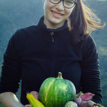 volunteer who works in our organic garden