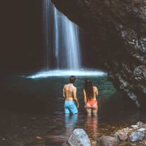 Stepabroad participant swimming in a waterfall in Australia